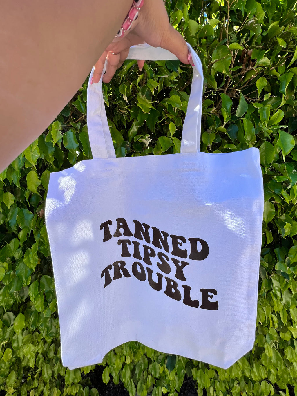 Tanned Tipsy Trouble